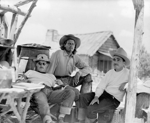 William Wellman, Joel McRea, and editor James B. Clark on the set of <i>Buffalo Bill.</i> 1944. USA. Directed by William A. Wellman. &copy; Twentieth Century Fox