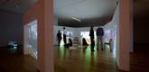 Aernout Mik. (Dutch, b. 1962). Installation view at MoMA. <i>Vacuum Room</i>. 2005. Six-channel video installation (color, silent), looped. Six rear-projection screens embedded in temporary architecture. Courtesy the artist, carlier | gebauer, Berlin and The Project, New York. © 2009 Aernout Mik. Photograph: © Jason Mandella