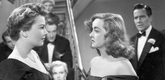 <i>All About Eve</i> (1950). Directed by Joseph Mankiewicz. Credit: MoMA Film Archive. Pictured: Anne Baxter, Bette Davis, George Sanders
