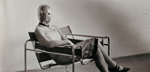 Erich Consem&ouml;ller. Untitled (Woman [Lis Beyer or Ise Gropius] in B3 club chair by Marcel Breuer wearing a mask by Oskar Schlemmer and a dress in fabric designed by Beyer). c. 1926
