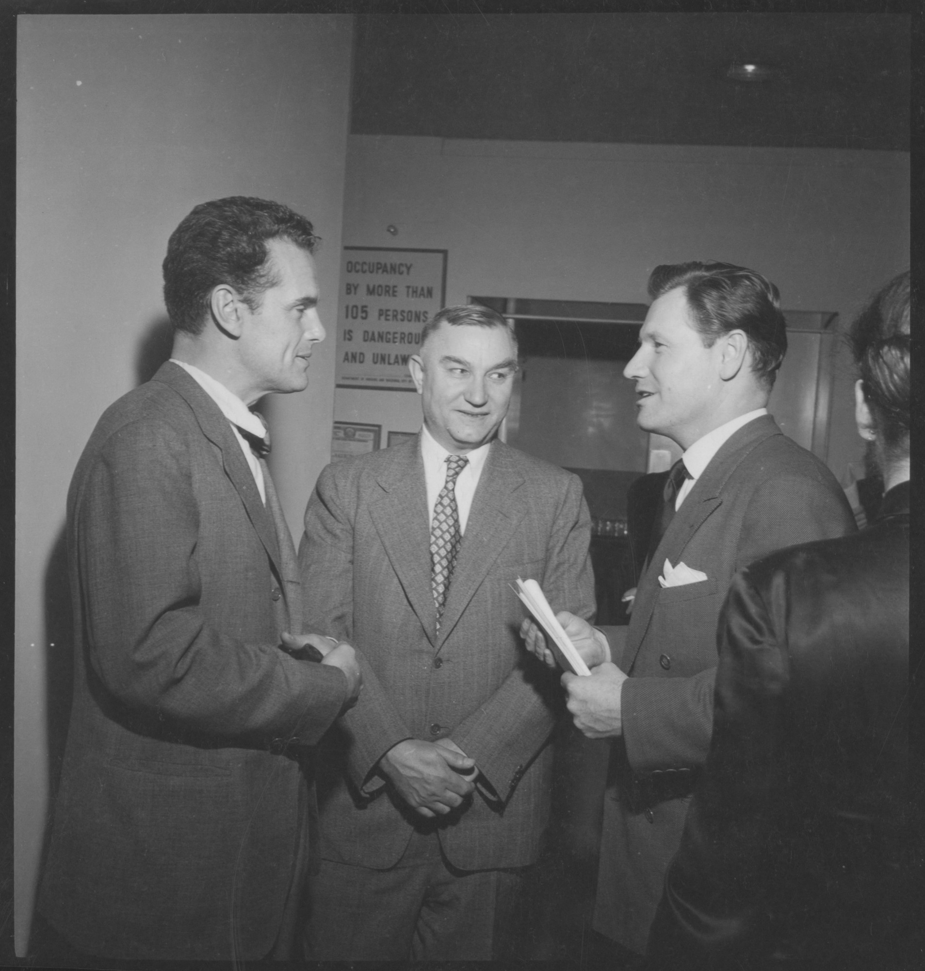 Nelson A. Rockefeller (right) with unidentified guests at an event in ...