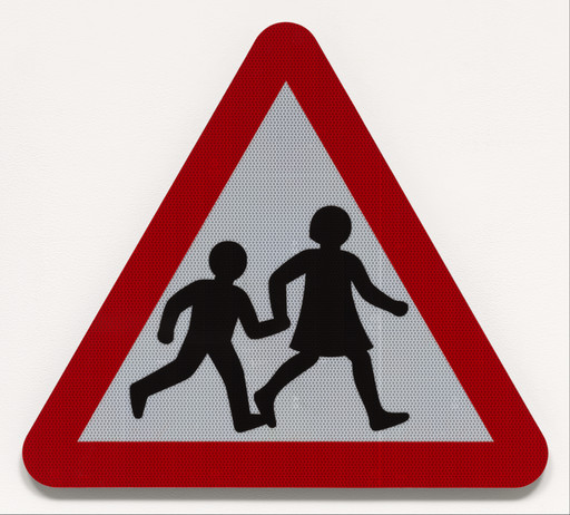 Iconic British road sign of two schoolchildren crossing updated by