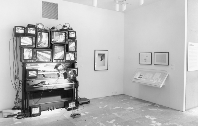 Nam June Paik. Untitled. 1993. Player piano, fifteen televisions, two cameras, two laser disc players, one electric light and light bulb, and wires. Overall approximately 8' 4" x 8' 9" x 48" (254 x 266.7 x 121.9 cm), including laser disc player and lamp. Bernhill Fund, Gerald S. Elliot Fund, gift of Margot Paul Ernst, and purchase. © 2013 Estate of Nam June Paik