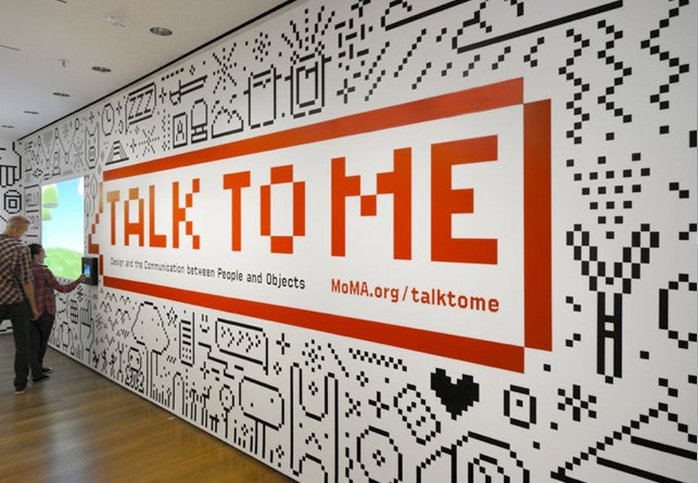 Title wall for <em>Talk to Me: Design and the Communication between People and Objects</em> on view at MoMA July 24–November 7, 2011