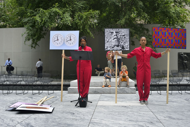 An Archive as Impetus performance in MoMA’s Abby Aldrich Rockefeller Sculpture Garden. Photograph courtesy of Xaviera Simmons)