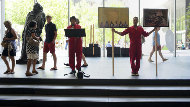 An Archive as Impetus performance in MoMA’s Agnes Gund Garden Lobby. Photograph courtesy of Xaviera Simmons)