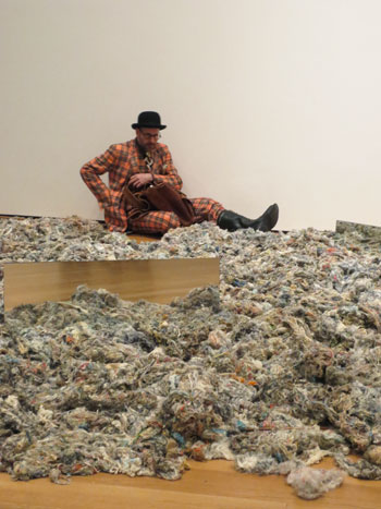 Kenneth Goldsmith performs a guerilla reading in the MoMA galleries. Photo: Jackie Armstrong