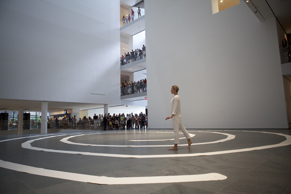 James Lee Byars. The Mile-Long Paper Walk. 1965–2014. Performed at The Museum of Modern Art, August 17, 2014 for the exhibition James Lee Byars. Performed by Katie Dorn; choreographic construction by Lucinda Childs. © 2014 Museum of Modern Art, New York. Photo: Julieta Cervantes