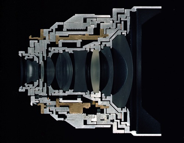 Christopher Williams. Cutaway model Zeiss Distagon T* 2.8/15 ZM/Focal length: 15mm. Aperture range: 2.8–22. No./of elements/groups: 11/9/Focusing range: 0.3 m–infinity. Image ratio at close range: 1:18/Coverage at close range: 43 cm × 65 cm. Angular field, diag./horiz./vert.: 110/ 100/77"/Filter: M 72 × 0.75. Weight: 500 g. Length: 86 mm/Product no. black: 30 82016. Serial no.: 15555891./(Subject to change.)/Manufactured by Carl Zeiss AG, Camera Lens Division, Oberkochen, Germany Studio Rhein Verlag, Düsseldorf/January 18, 2013. 2013. Pigmented inkjet print, paper: 16 × 20" (40.6× 50.8 cm); framed: 30 1/2 × 33 3/8" (77.5 × 84.8 cm). Private collection. © Christopher Williams