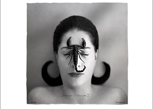 Marina Abramović's Portrait with Scorpion (Closed Eyes) (2005), shown reproduced on the limited-edition scarf, with signature