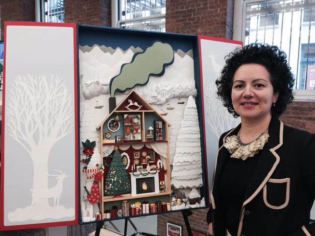 Elsa Mora with her work on display at the MoMA Design Store Soho, November 9, 2014. Photo: C. Kelly