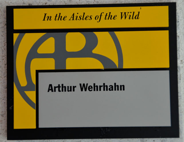 The nameplate on Art Wehrhahn's office door in Hamlin. The film it refers to, In the Aisles of the Wild, is a silent 1912 Biograph Film directed by D. W. Griffith. All of the rooms in the Bartos Center have plates that announce a Biograph film and cheekily refer to what goes on in the room and/or the person who inhabits the office space.