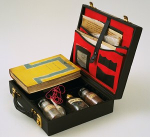 John Latham. Art and Culture. 1966–69. Leather case containing book, letters, photostats, and labeled vials filled with powders and liquids, 3 1/8 x 11 1/8 x 10" (7.9 x 28.2 x 25.3 cm). The Museum of Modern Art, New York. Blanchette Hooker Rockefeller Fund. © 2015 John Latham