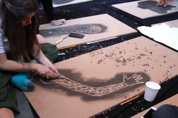 Carving large-scale woodblocks for the final collaborative project