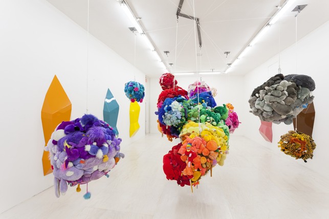 Mike Kelley. Deodorized Central Mass with Satellites. 1991/1999. Plush toys sewn over wood and wire frames with styrofoam packing material, nylon rope, pulleys, steel hardware and hanging plates, fiberglass, car paint, and disinfectant, Overall dimensions variable. Partial gift of Peter M. Brant, courtesy the Brant Foundation, Inc. and gift of The Sidney and Harriet Janis Collection (by exchange), Mary Sisler Bequest (by exchange), Mr. and Mrs. Eli Wallach (by exchange), The Jill and Peter Kraus Endowed Fund for Contemporary Acquisitions, Anne and Joel Ehrenkranz, Mimi Haas, Ninah and Michael Lynne, and Maja Oeri and Hans Bodenmann