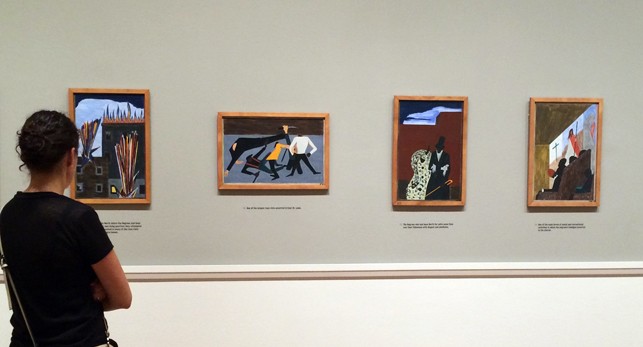 Installation view of One-Way Ticket: Jacob Lawrence's Migration Series and Other Visions of the Great Movement North at The Museum of Modern Art, New York (April 3–September 7, 2015)