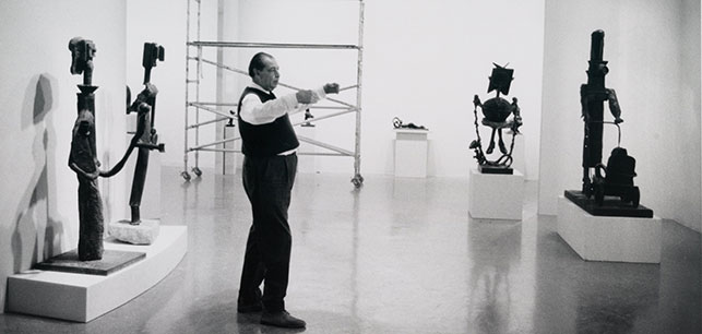 René d'Harnoncourt, Director of the Museum, installing the exhibtion. Photograph by Dan Budnik. Photographic Archive. The Museum of Modern Art Archives, New York