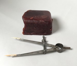 Block of French casting wax and bamboo-tipped calipers