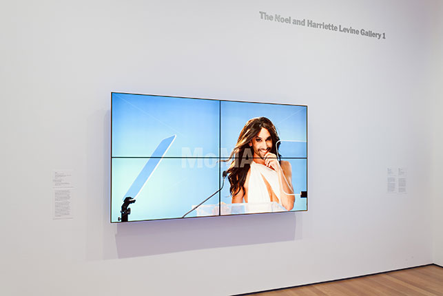 DIS. Positive Ambiguity (beard, lectern, teleprompter, wind machine, confidence). 2015. Installation view, Ocean of Images: New Photography 2015, The Museum of Modern Art, November 7, 2015–March 20, 2016. © 2016 The Museum of Modern Art. Photo: Thomas Griesel